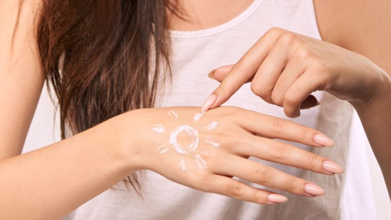 Best SPFs - woman with SPF on her hand