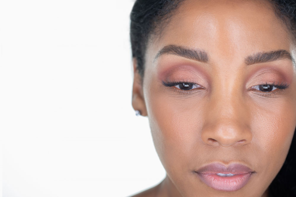 Beautiful woman face with healthy skin
