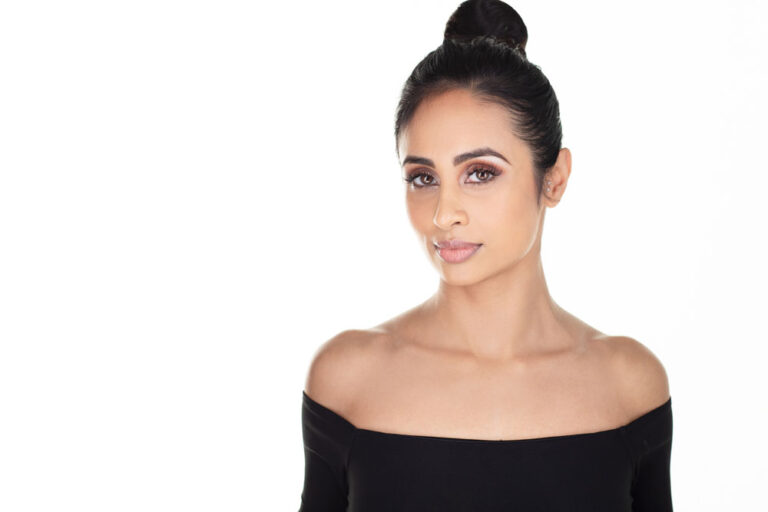 Beautiful young woman with elegant make-up
