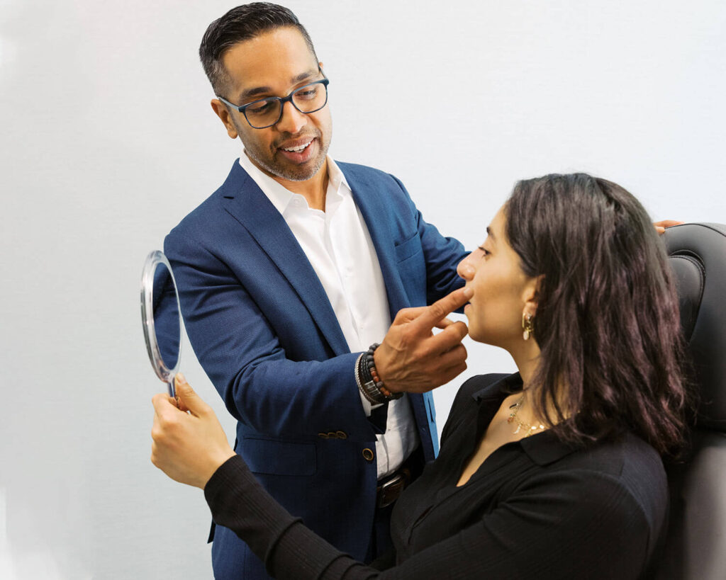 Dr. Sachin Parikh evaluating a patient