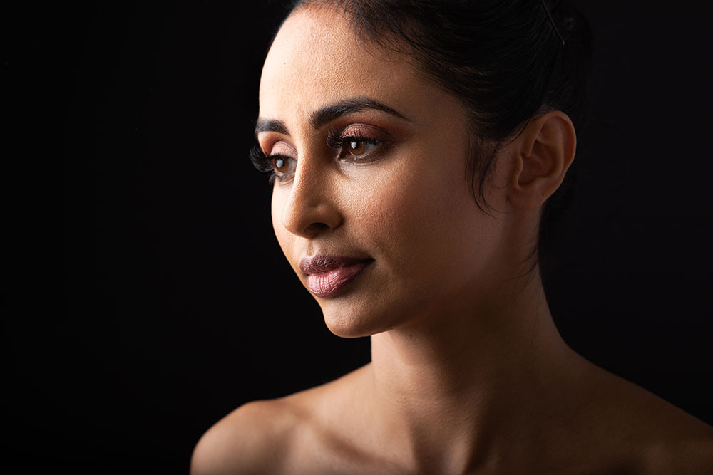 Beautiful young woman with elegant make-up