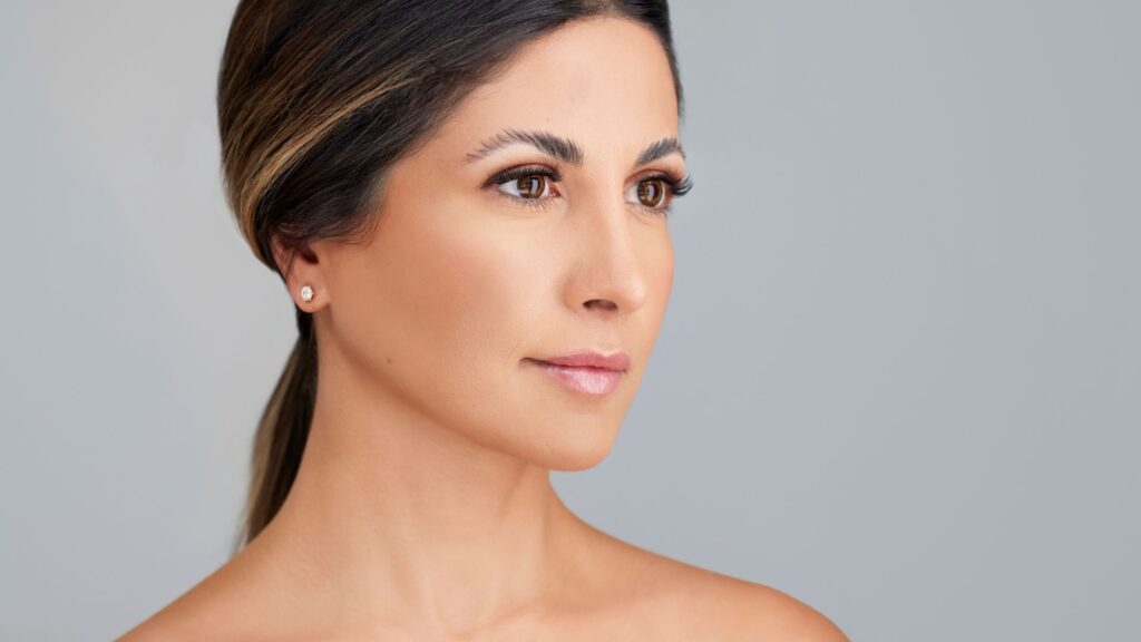 Beautiful woman with her hair pulled back at L&P Aesthetics