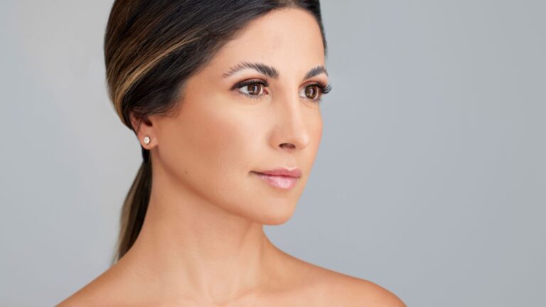 Beautiful woman with her hair pulled back at L&P Aesthetics